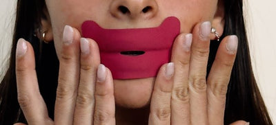Mouth tape on lips